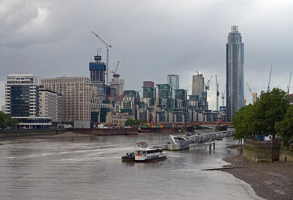 Vauxhall Bridge below St George Wharf Tower, seen along the Thames from Lambeth Bridge.